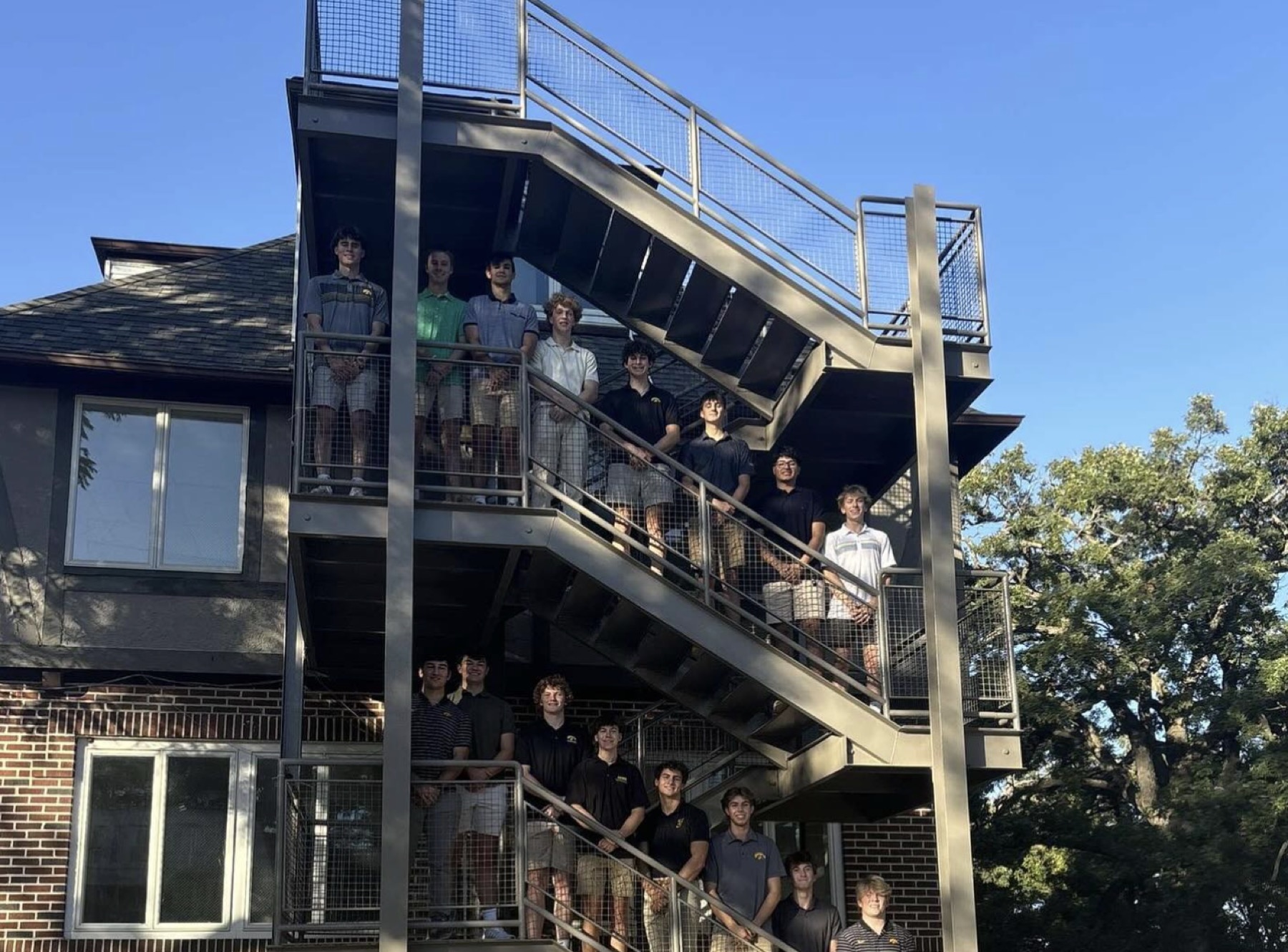 Chapter members on the house stairs